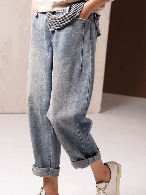 Avec ses pinces astucieusement places, ce jean boyfriend frle la perfection !