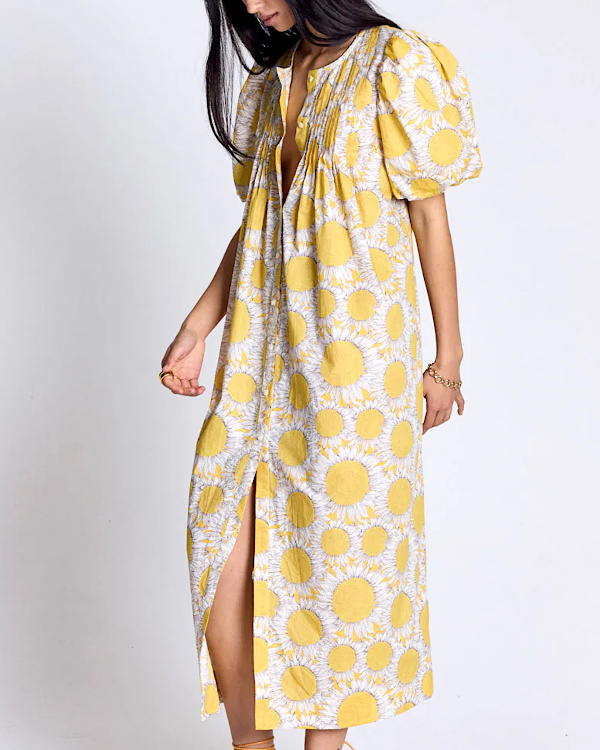	Robe mi-longue imprimé fleuri jaune, manches bouffantes